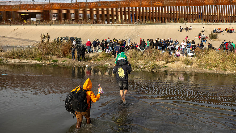 More than 100 migrants storm border and knock down guards in Texas in